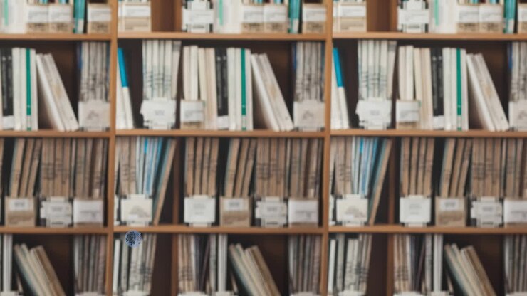Animation of old skool vs new school text on blue circle moving over books on library shelves