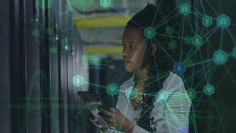 animation of network of connections over female african american server room worker