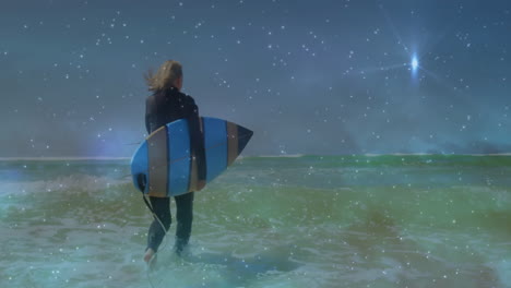 senior surfer wading in ocean waves, integrating starry sky motion graphics for technology pitch