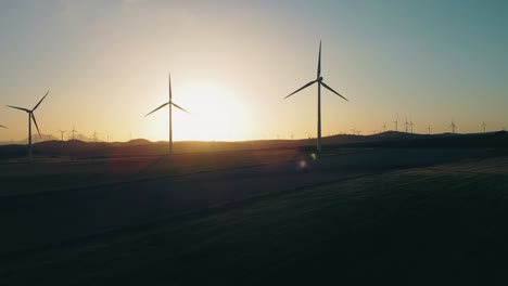 windmill in countryside of spain at sunset aerial