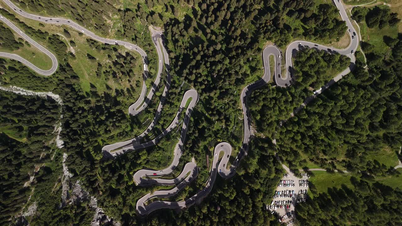 Maloja Pass Mountain pass road Switzerland, S shaped alpine, forest aerial
