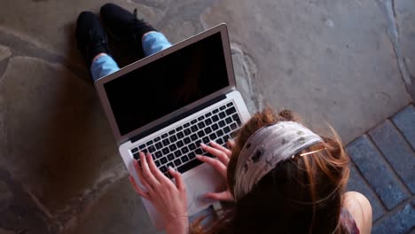 Schoolgirl-using-laptop