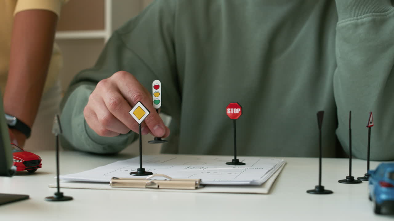 운전 학교의 교사와 학생