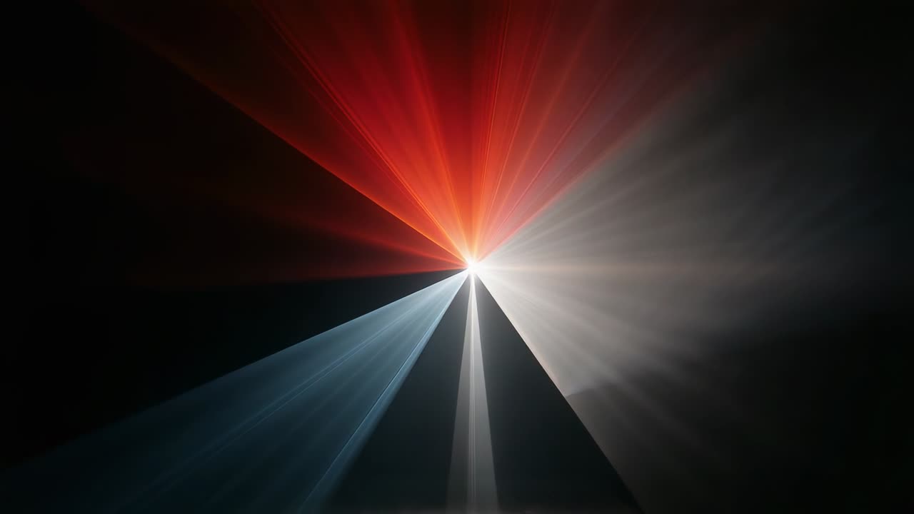 Brightening central point initiating red blue white beams growing in dark studio, with wedge haze
