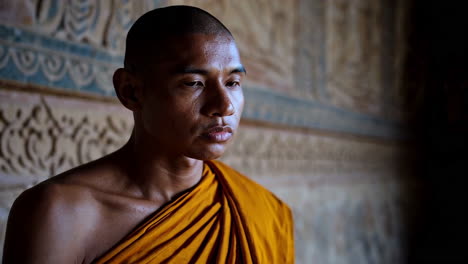 buddhist monks meditating in an ancient temple