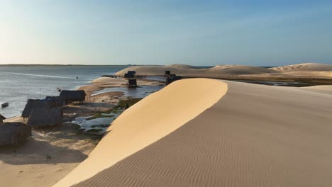 dune landscape reveals parnaíba river delta native people wooden huts and settlements