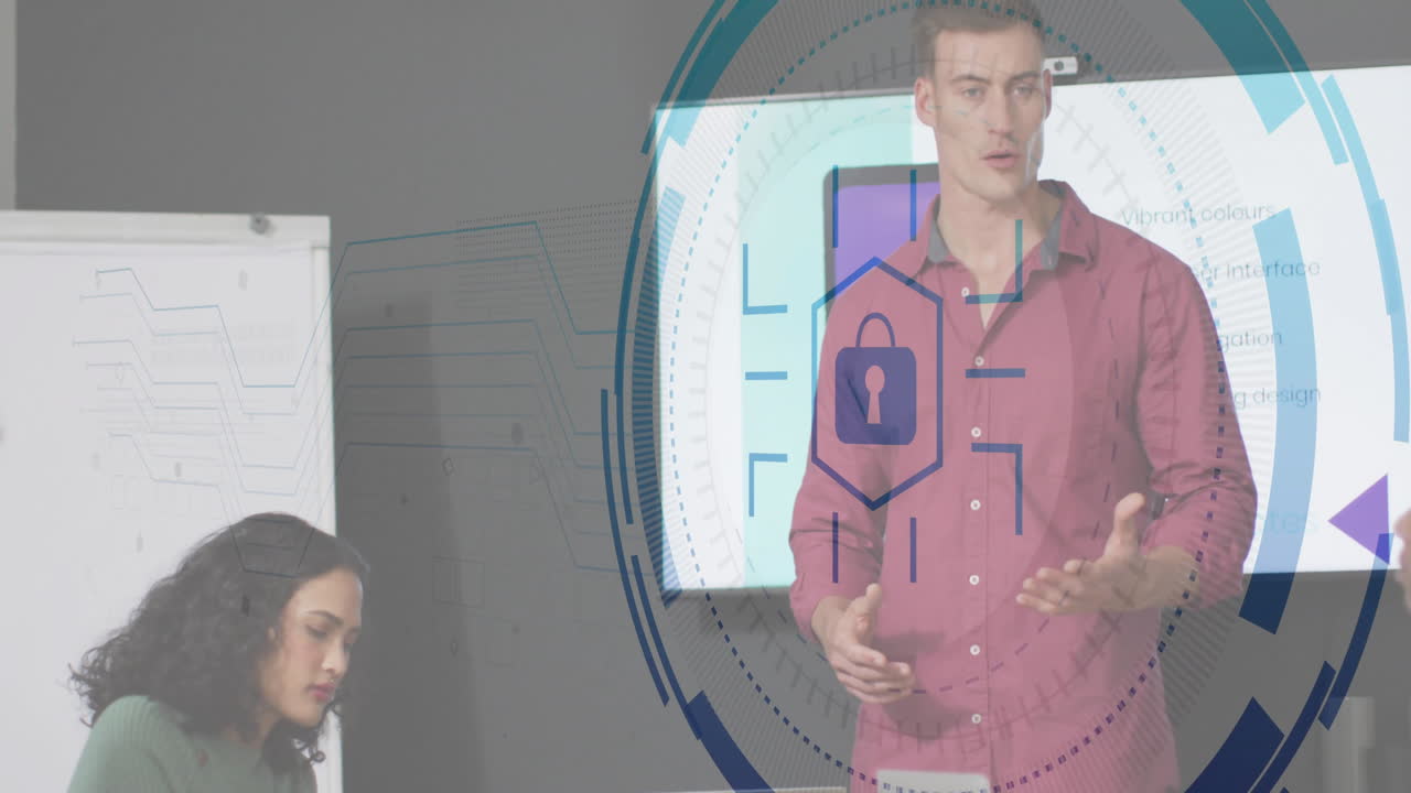 Man presenting UI on large display in modern office, woman writing notes with cybersecurity overlay