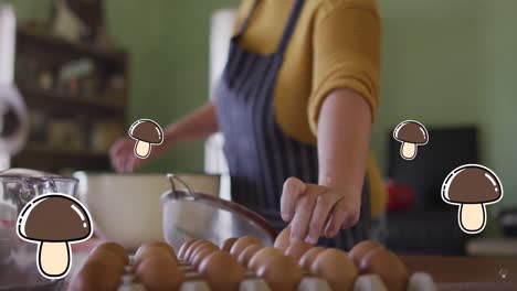 Animation-of-mushroom-icons-over-caucasian-woman-cooking