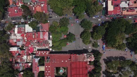 aerial drone footage of san juan bautista church atrium in central coyoacan, mexico city