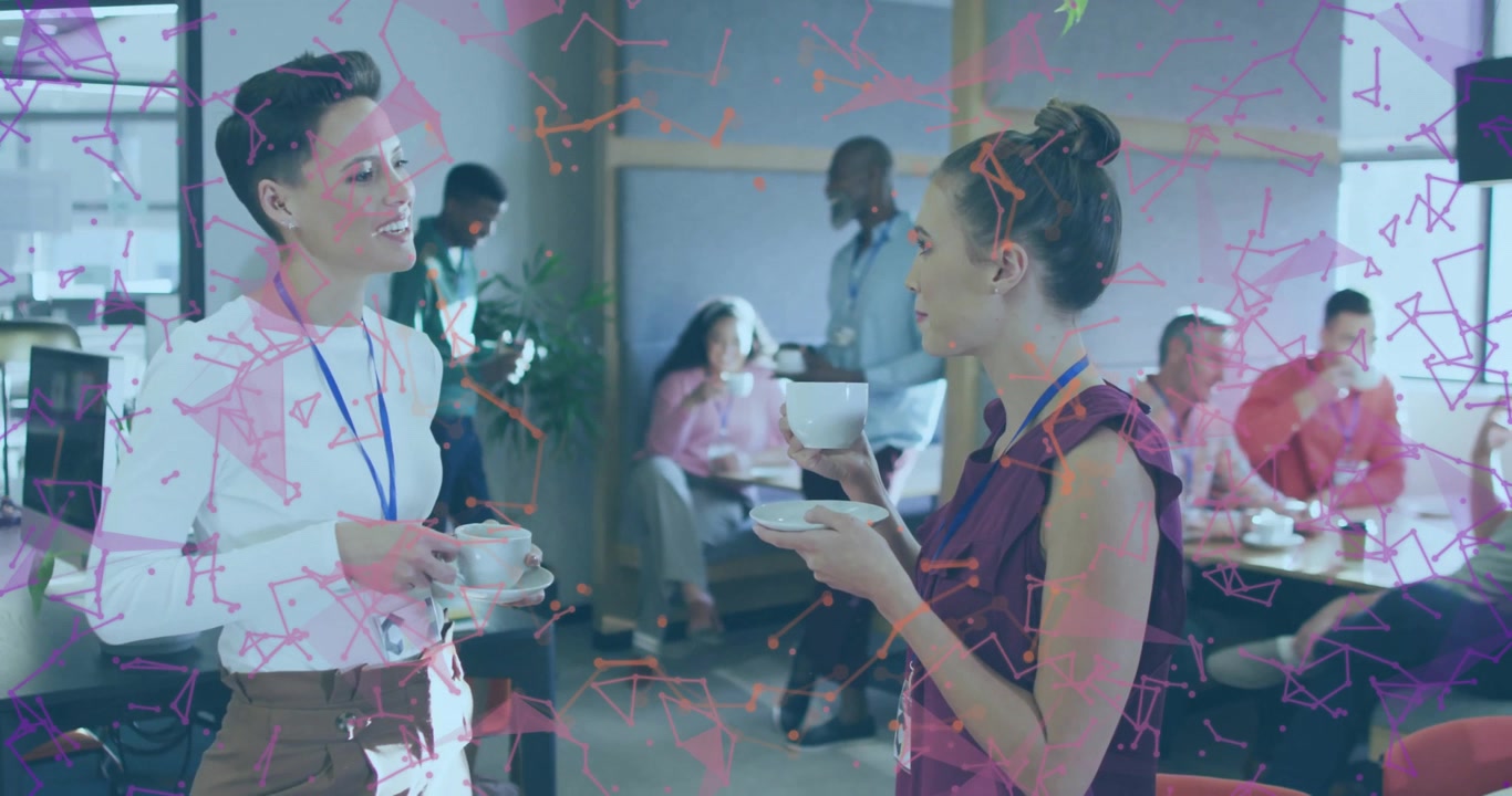 Female coworkers sipping coffee in office lounge, causing animated steam drifting around cups