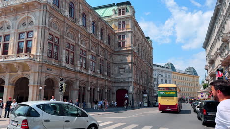 vienna, austria - june 9, 2025: exploring wien by electric bus tour. tourists gather around an electric bus in vienna, austria, enjoying a sunny day and exploring historic sites
