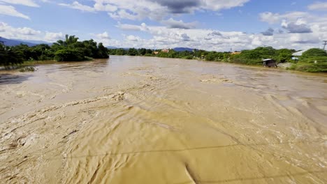 Raging-Flash-Floods-Flowing-In-Chiang-Mai-Province,-Northern-Thailand