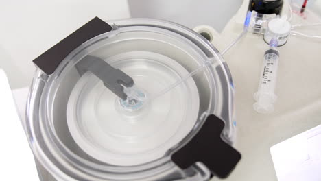 working centrifuge machine in the hospital. separating plasma from blood. prp-therapy.