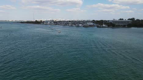 aerial-of-New-Pass-near-Mote-Marine-Laboratory-and-Aquarium,-Sarasota,-Florida