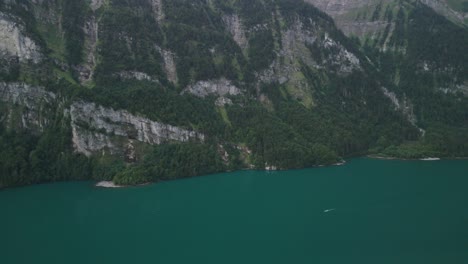 klöntalersee lake in swiss alps mountain valley, alpine switzerland nature