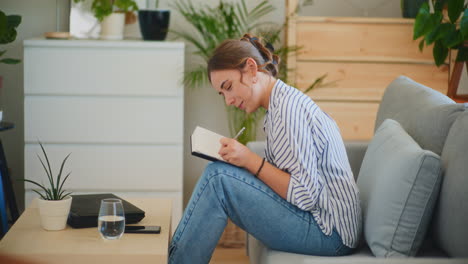 successful young businesswoman on sofa