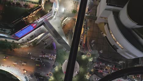 aerial top down mbk shopping mall and business district with traffic road in sukhumvit