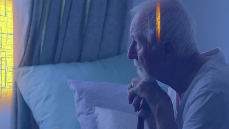 Senior man sitting on bed holding cane, with animated health icon overlays moving around