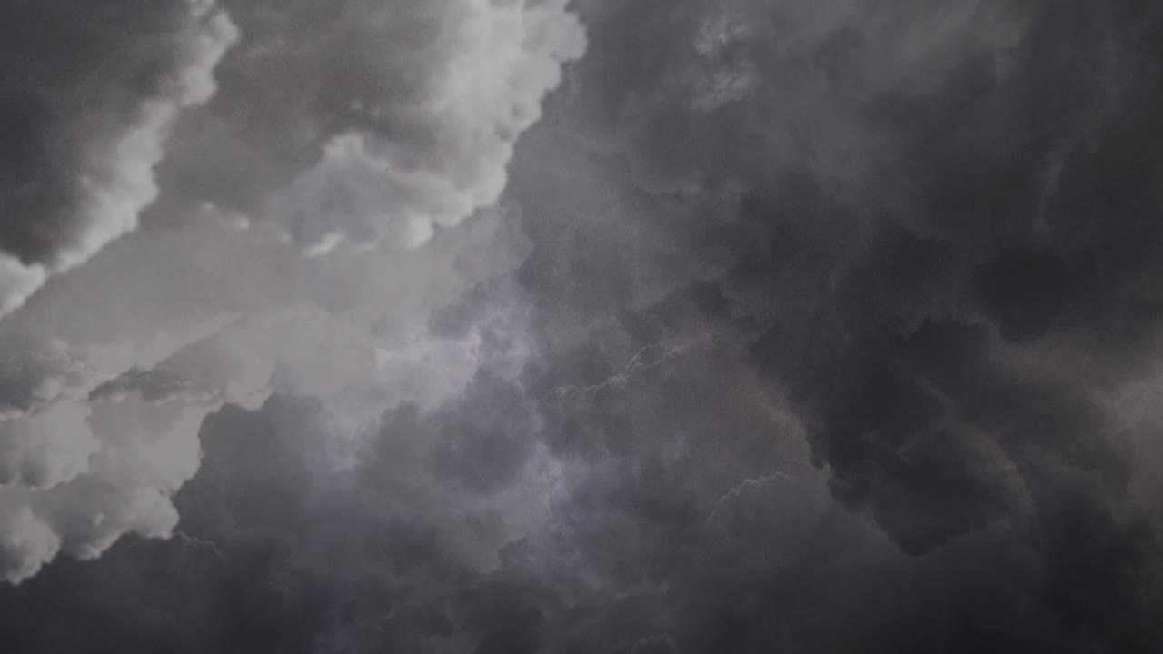 View of thunderstorm, dark clouds moving away