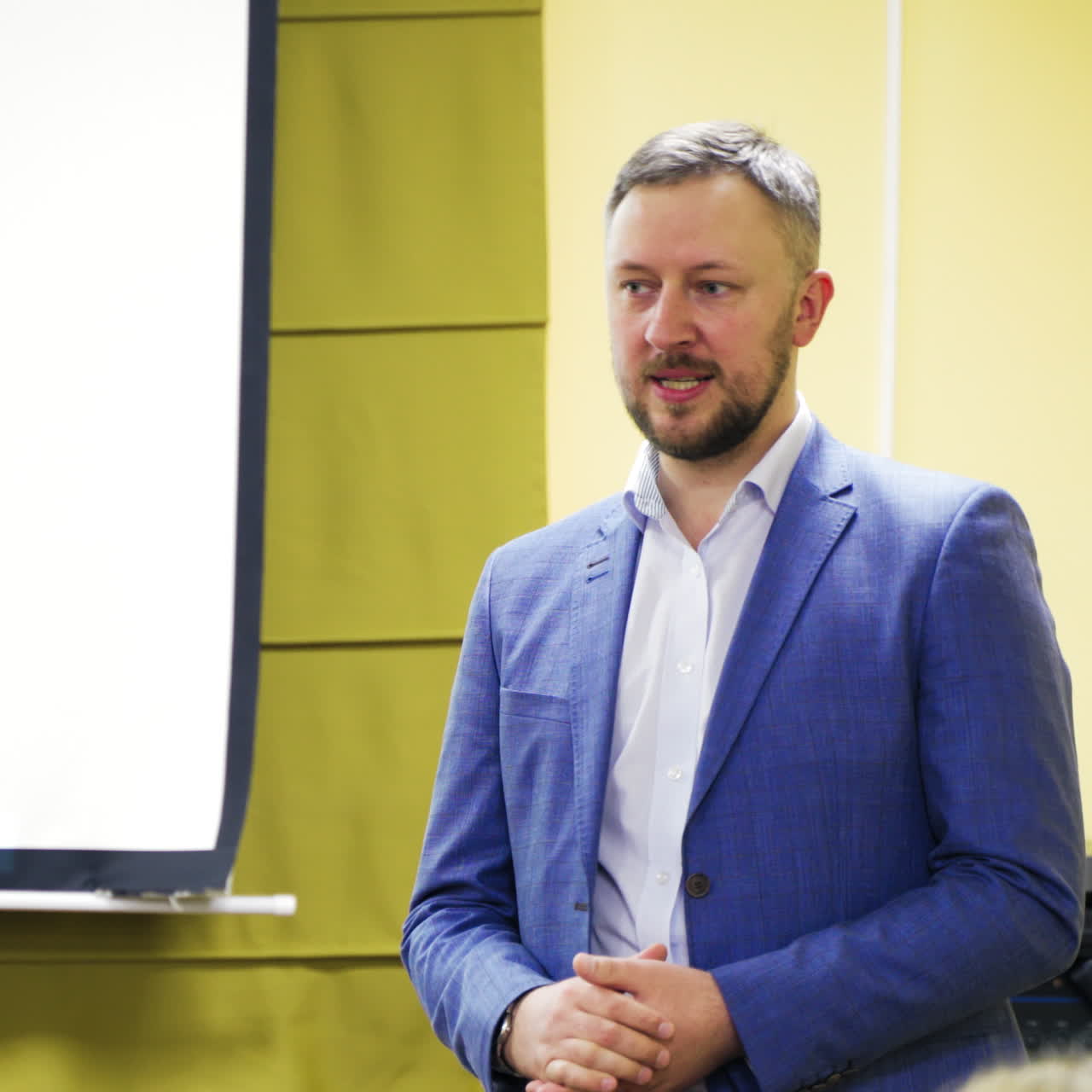 Speaker at a business training conference.