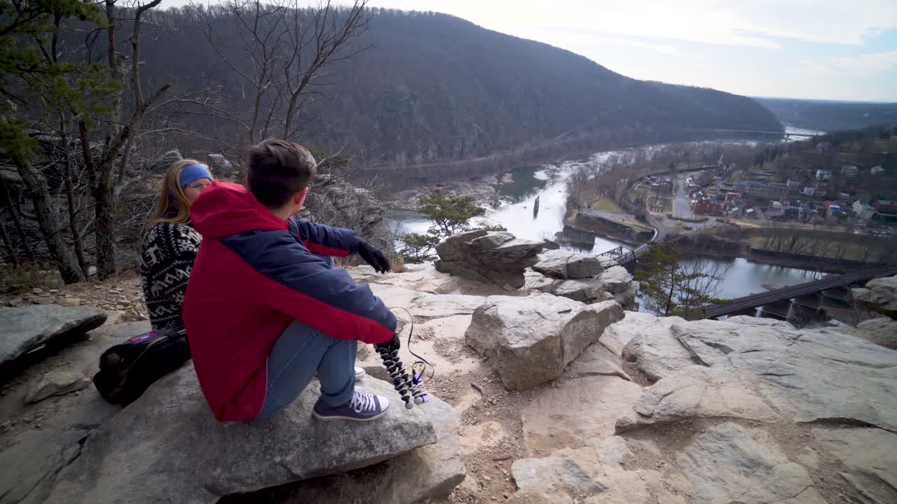 Scenic view of a town and river from a cliff