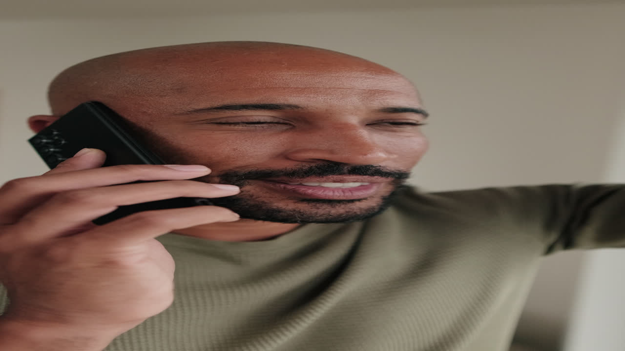 Man on Phone Call at Home