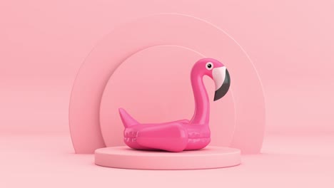 video de resolución 4k: piscina de verano inflable de goma flamenco rosado juguete girando sobre cilindros rosados productos pedestal de escenario sobre un fondo rosado