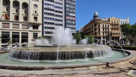 monumental fountain in the center of plaza mascletá in the city of valencia, spain