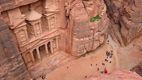 view from above, stunning view of al-khazneh (the treasury) one of the most elaborate temples in petra, a city of the nabatean kingdom, jordan