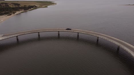 drone follows a truck crossing the laguna garzon bridge