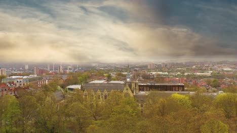 Aerial-view-of-a-suburban-city-with-scenic-cloudy-sky-in-the-background