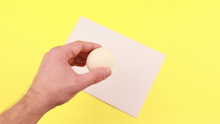 4k Drawing of an egg appears on a white piece of paper.