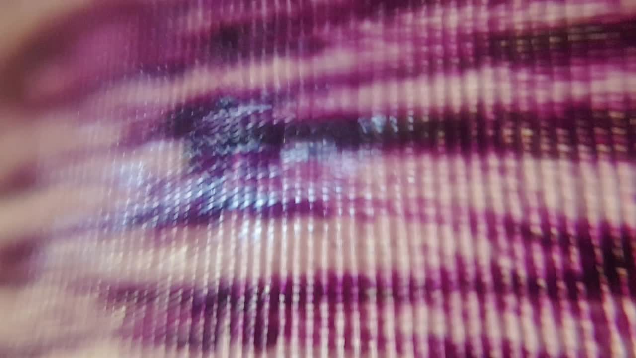 fascinante resumen surrealista de ensueño de tela de fibra tejida que fluye de fondo con impresionantes colores pastel suaves moviéndose y mezclándose en cámara lenta de paralaje