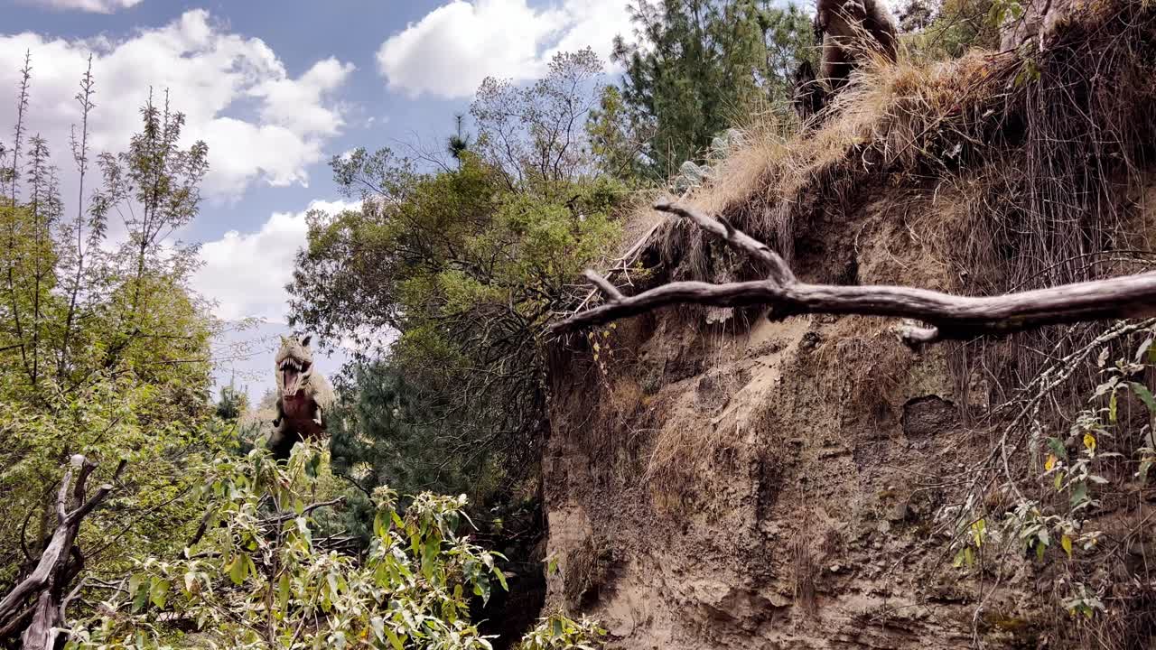 A dinosaur standing amidst trees with rugged terrain and cloudy skies in the background