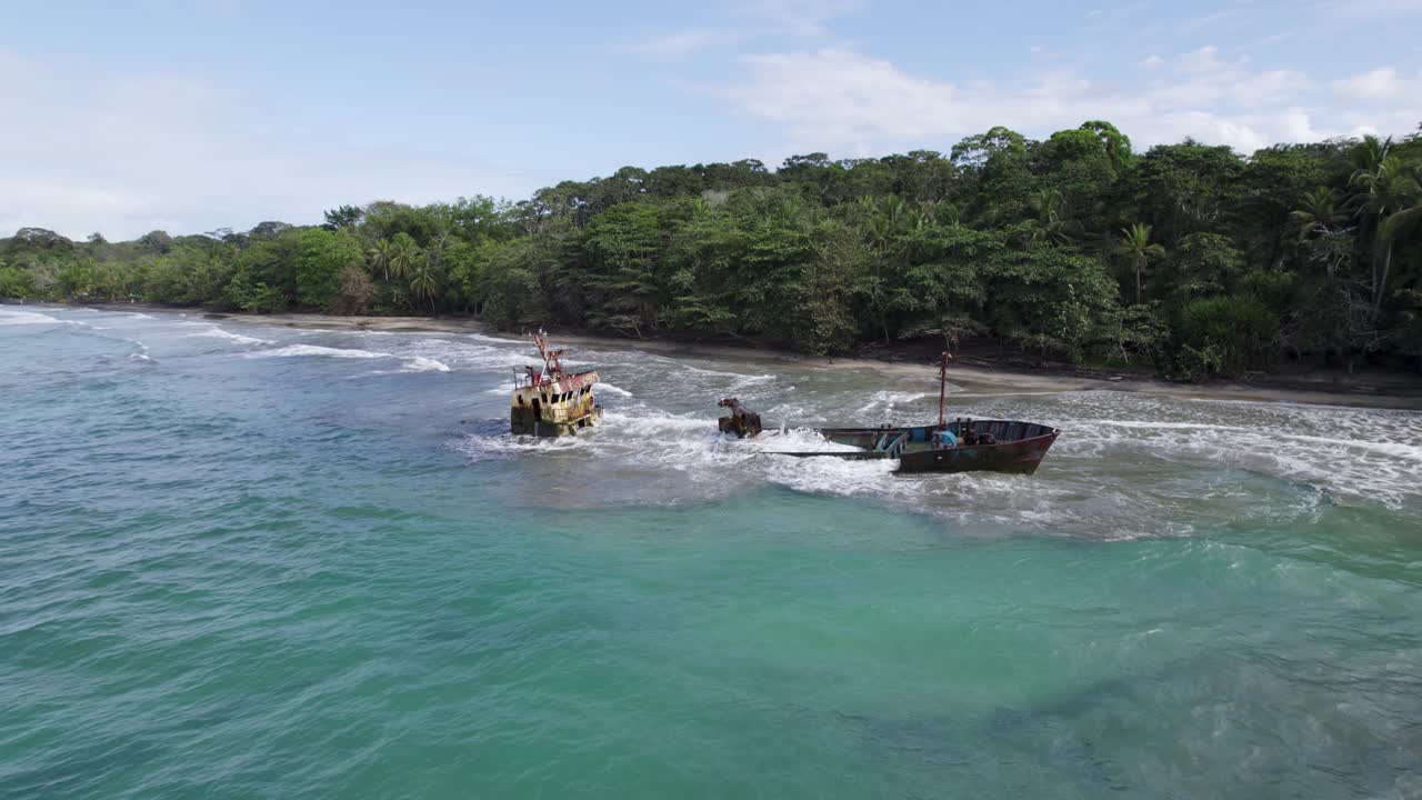 Shipwreck off the coast of Manzanillo with lush tropical forest in the background