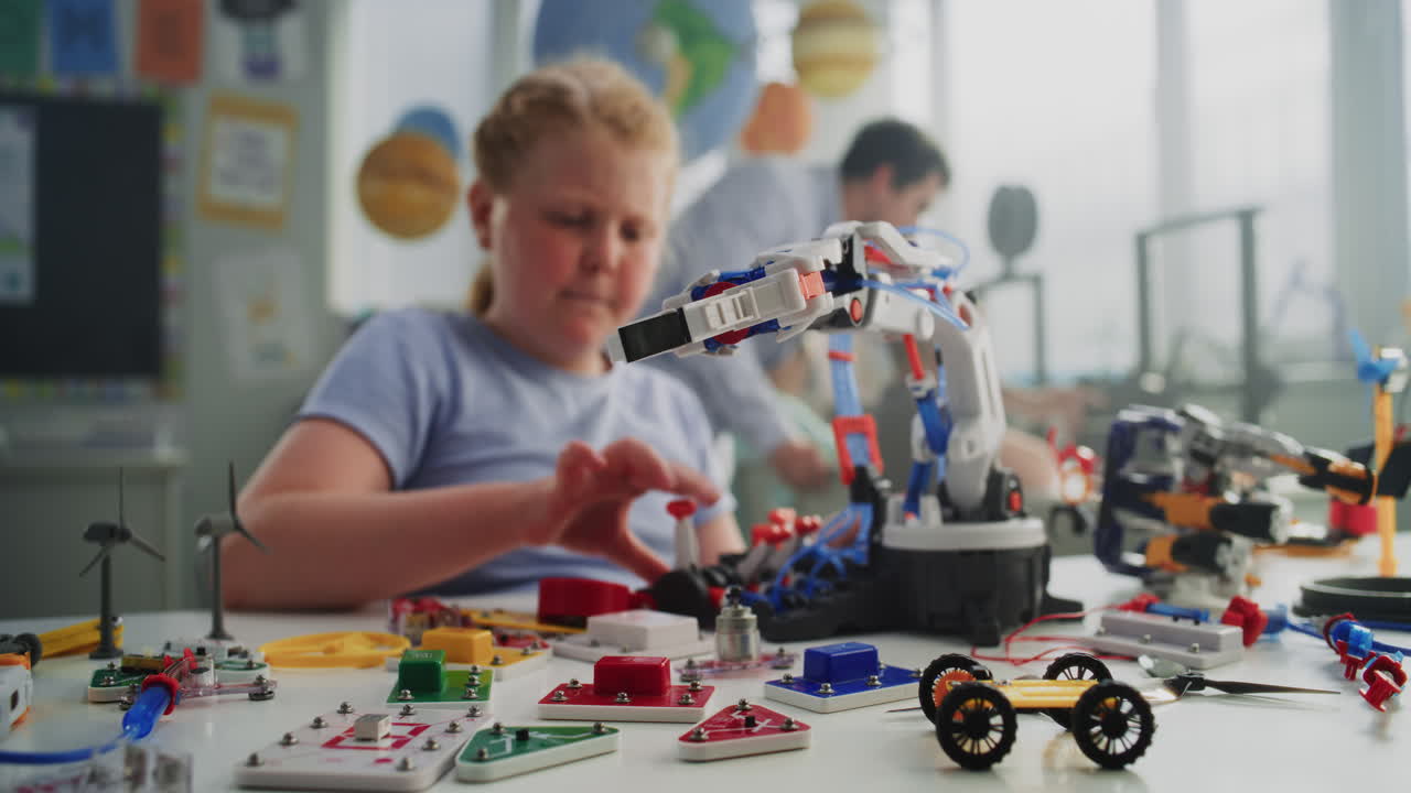 Talented Young Girl Studying Robotic Arm Model Learning Engineering and Robotics