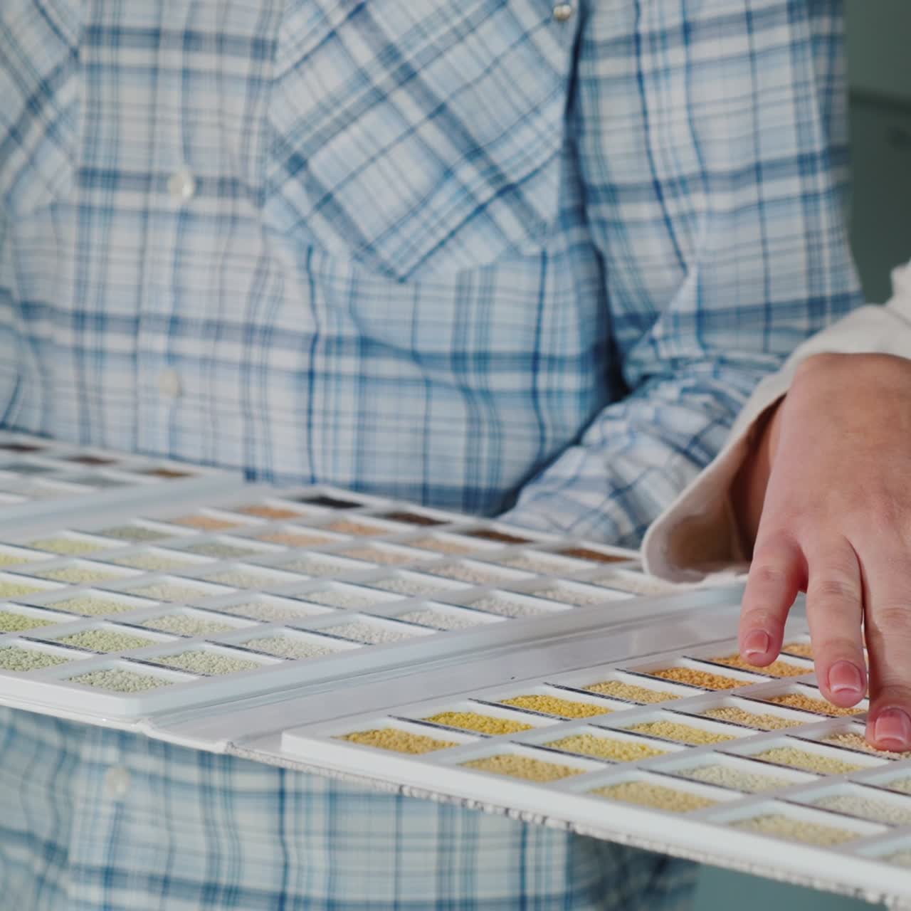 Customer Chooses Building Materials From An Image In A Catalog 1