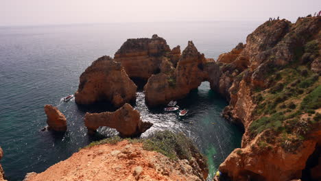 boat tours at ponta da piedade - scenic rock formations on coastline of lagos in portugal