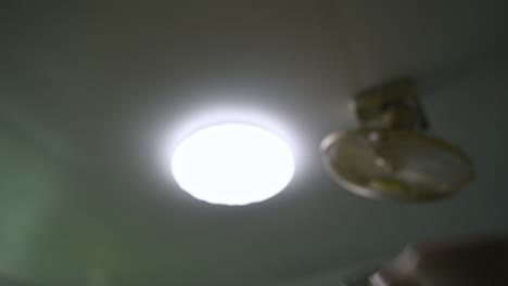 adjusting the brightness level of the ceiling light by remote control