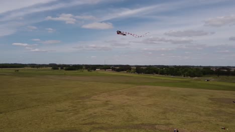 beautiful shot of stingray shaped kite flying peacefully in aeromodelling event in buenos aires