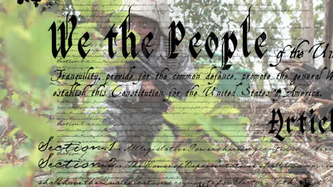 united states constitution text animation over people sitting outdoors in forest