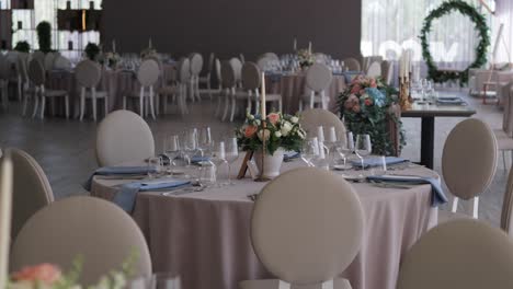 elegant wedding reception with floral centerpieces and soft decor