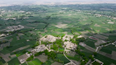 flying over muddy homes and farm land