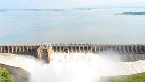 sluice gates at a reservoir overflowing, vaaldam south africa, drone shot