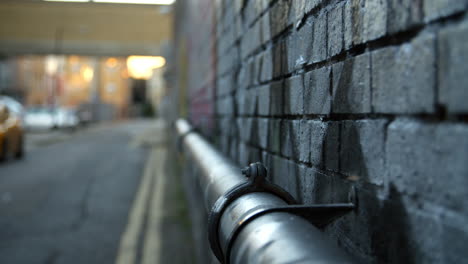 close up of graffiti on brick wall in east london