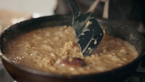 cooking risotto with mushrooms