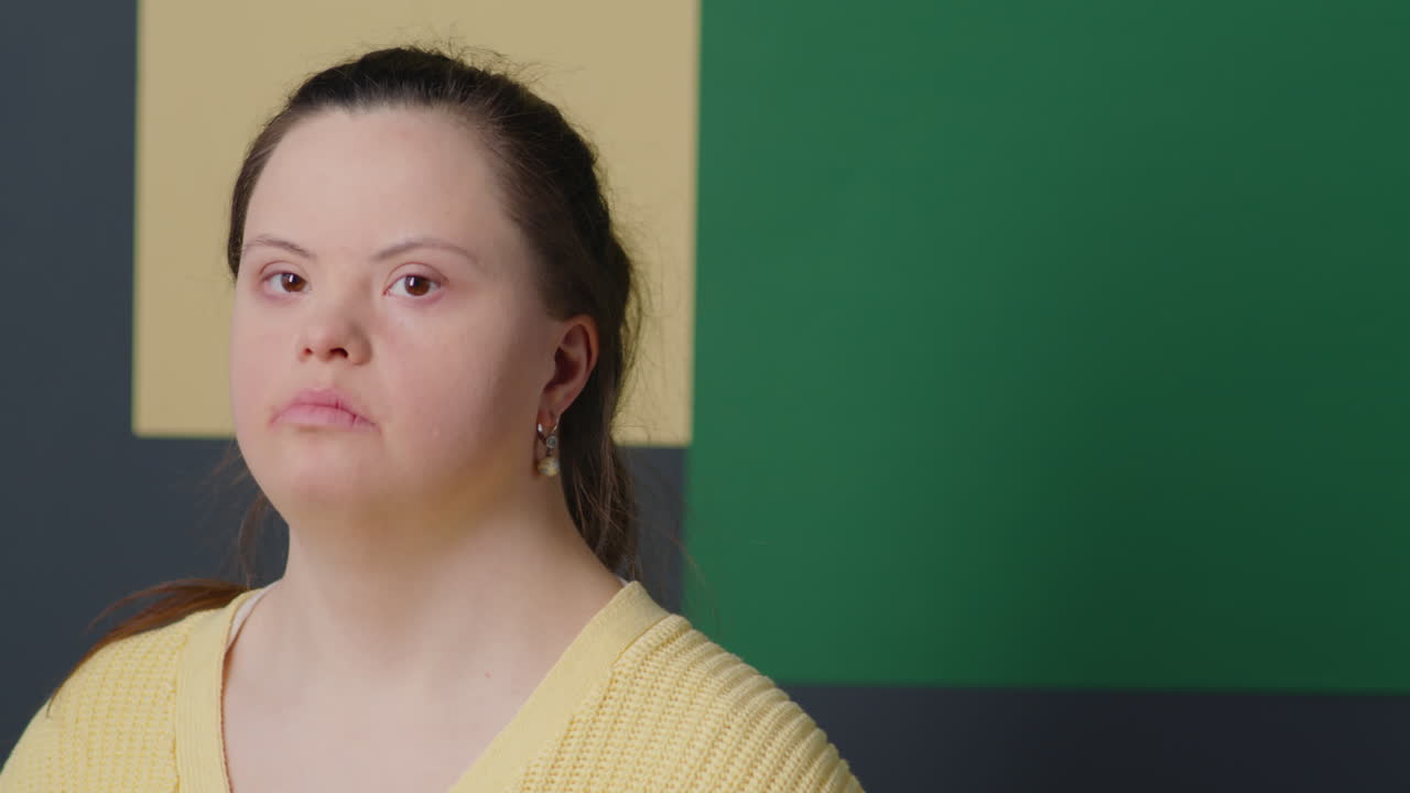 Studio Portrait of Girl with Down Syndrome
