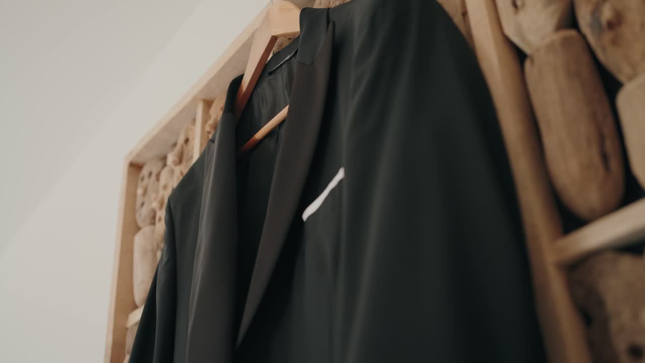 Stylish close up of groom suit jacket with pocket square for wedding