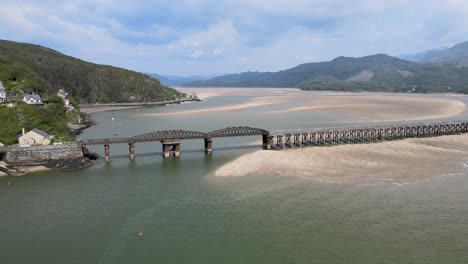 barmouth railway bridge panning drone footage north wales, uk