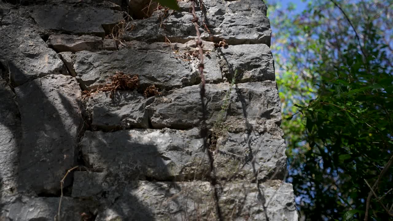 Old Stone House with Mysterious Walls Standing Silent in Forgotten Countryside
